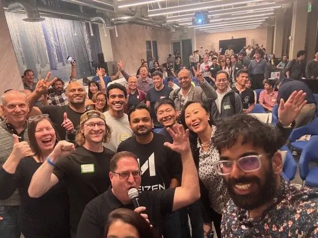 GenAI Meetup attendees smiling for a group photo